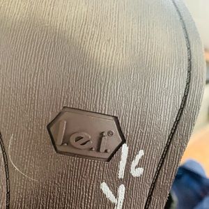 Brown with white stitching LEI cowboy boots